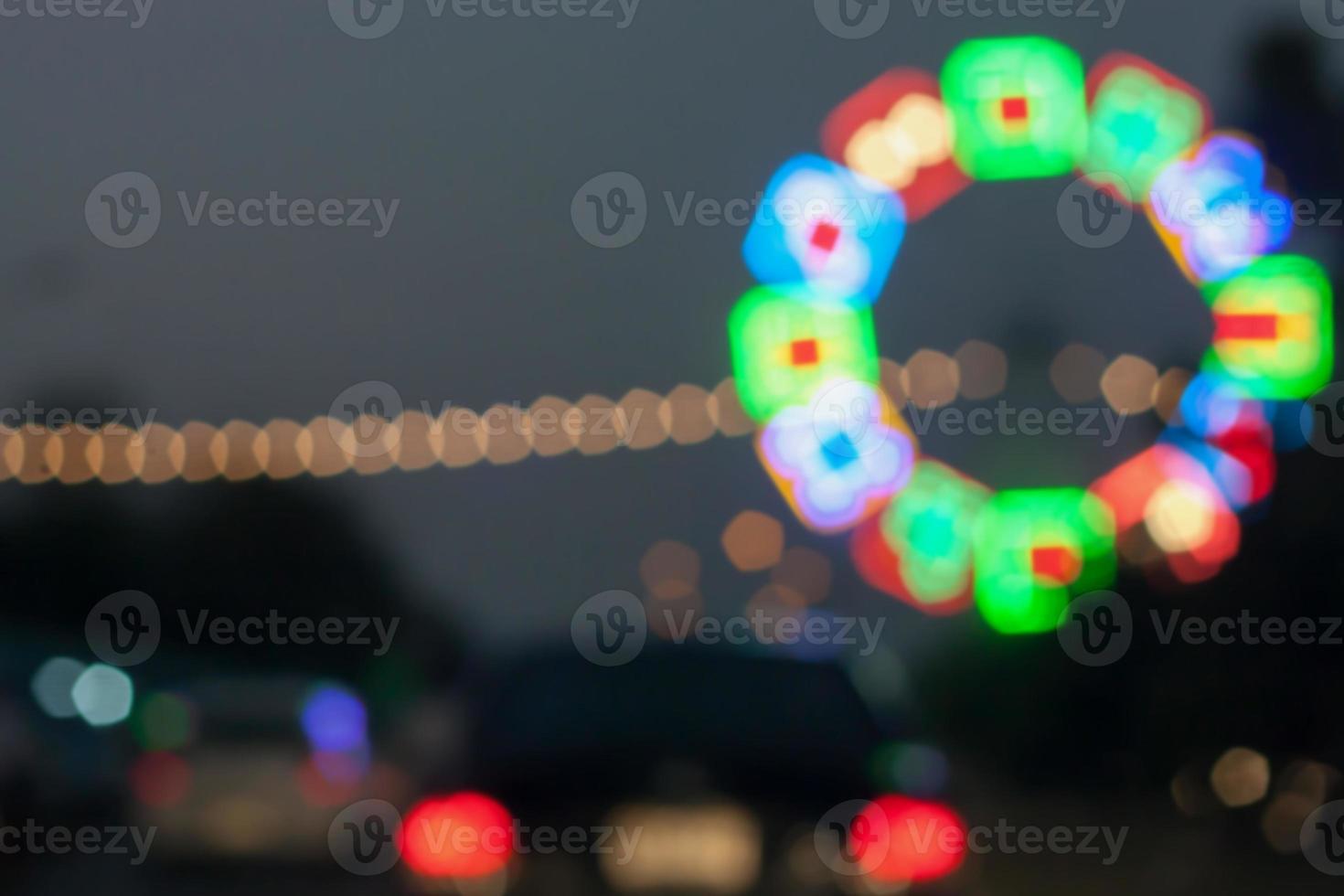 beautiful background of bokeh lights at night on road with car photo