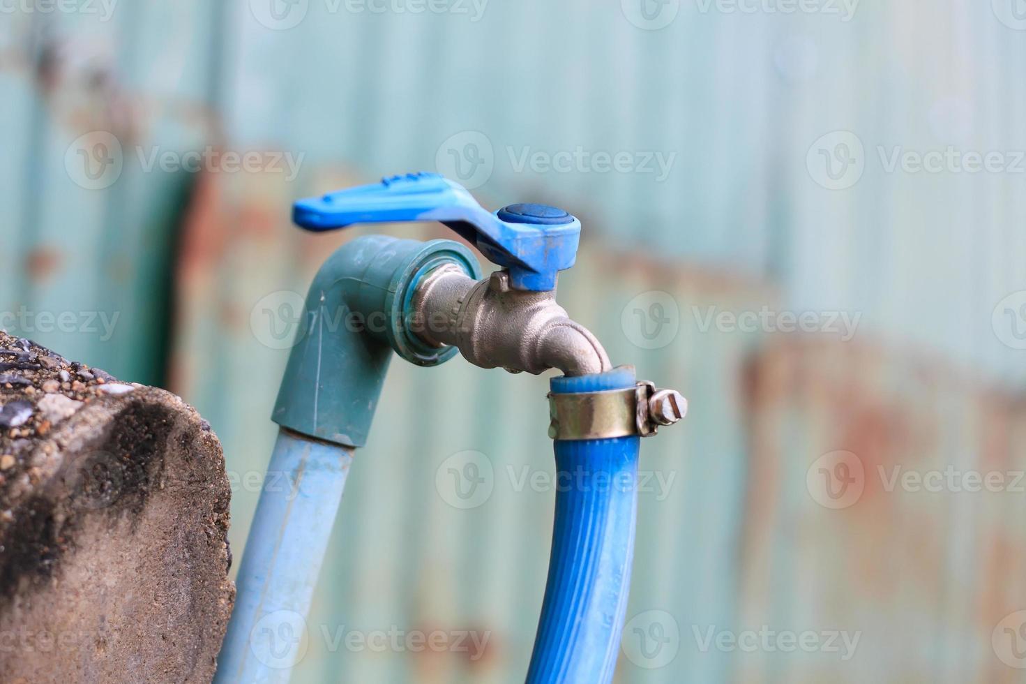 water tap with rubber line photo