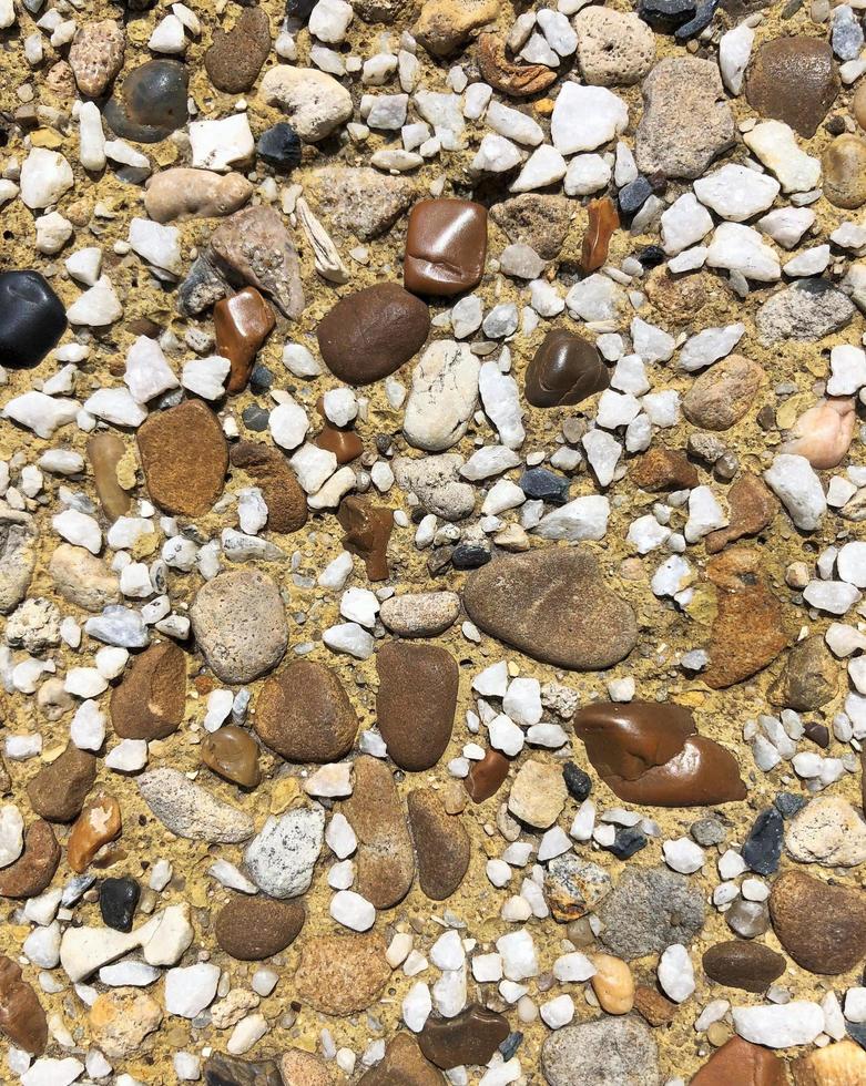 A surface with different rocks photo