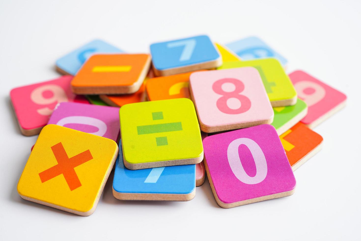 Number wood block cubes for learning Mathematic, education math concept. photo