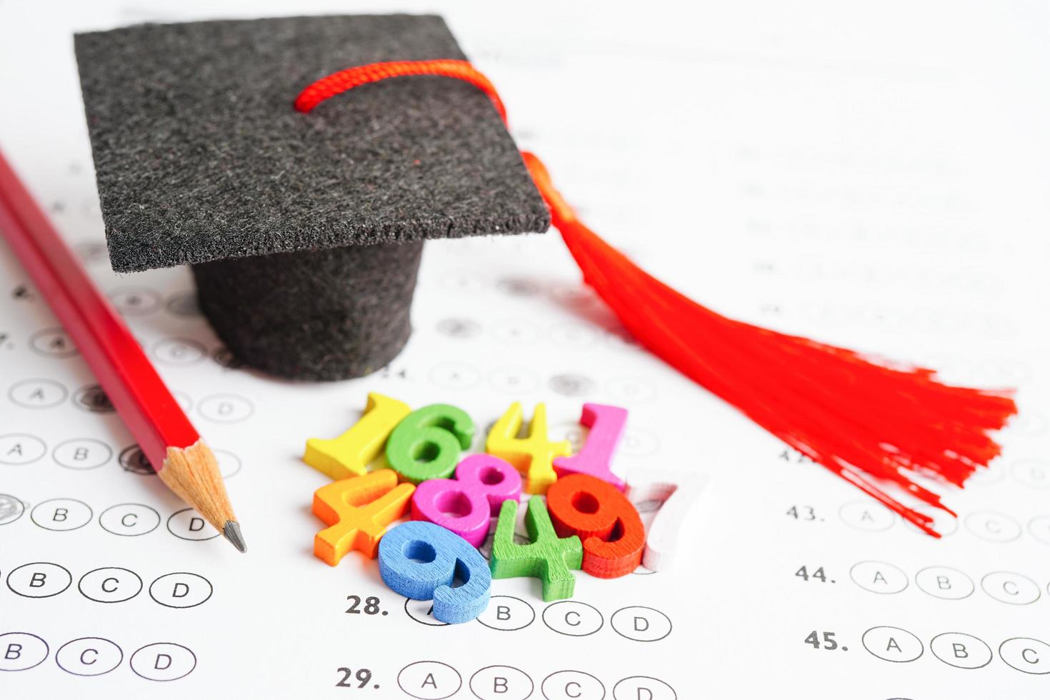 Math number with graduation gap hat on answer sheet test choice for learning Mathematic, education math concept. photo