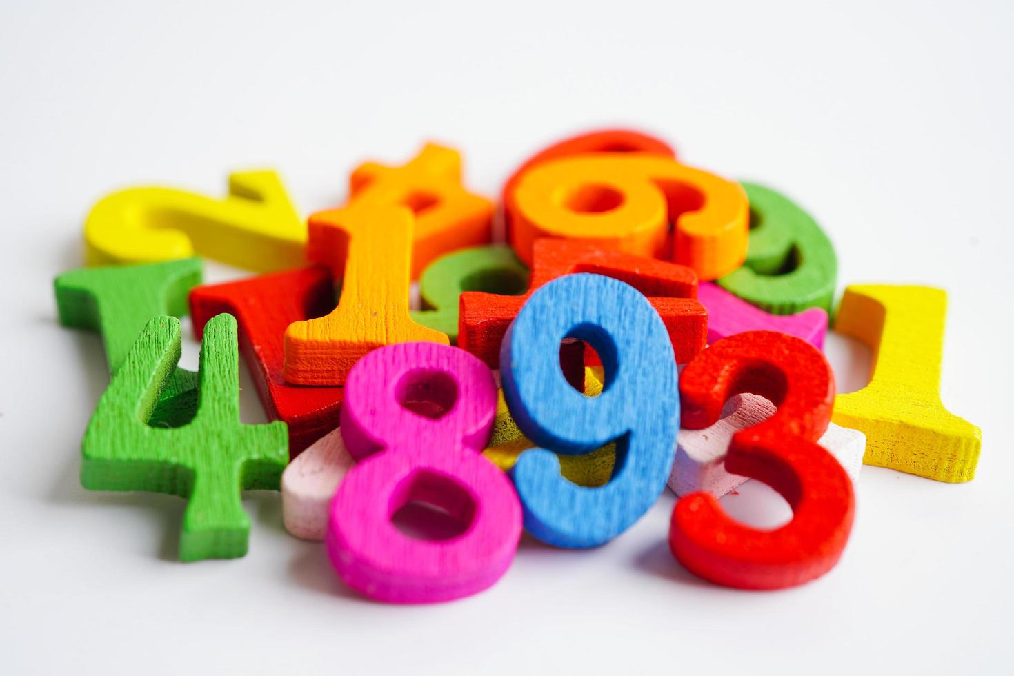 Number wood block cubes for learning Mathematic, education math concept. photo