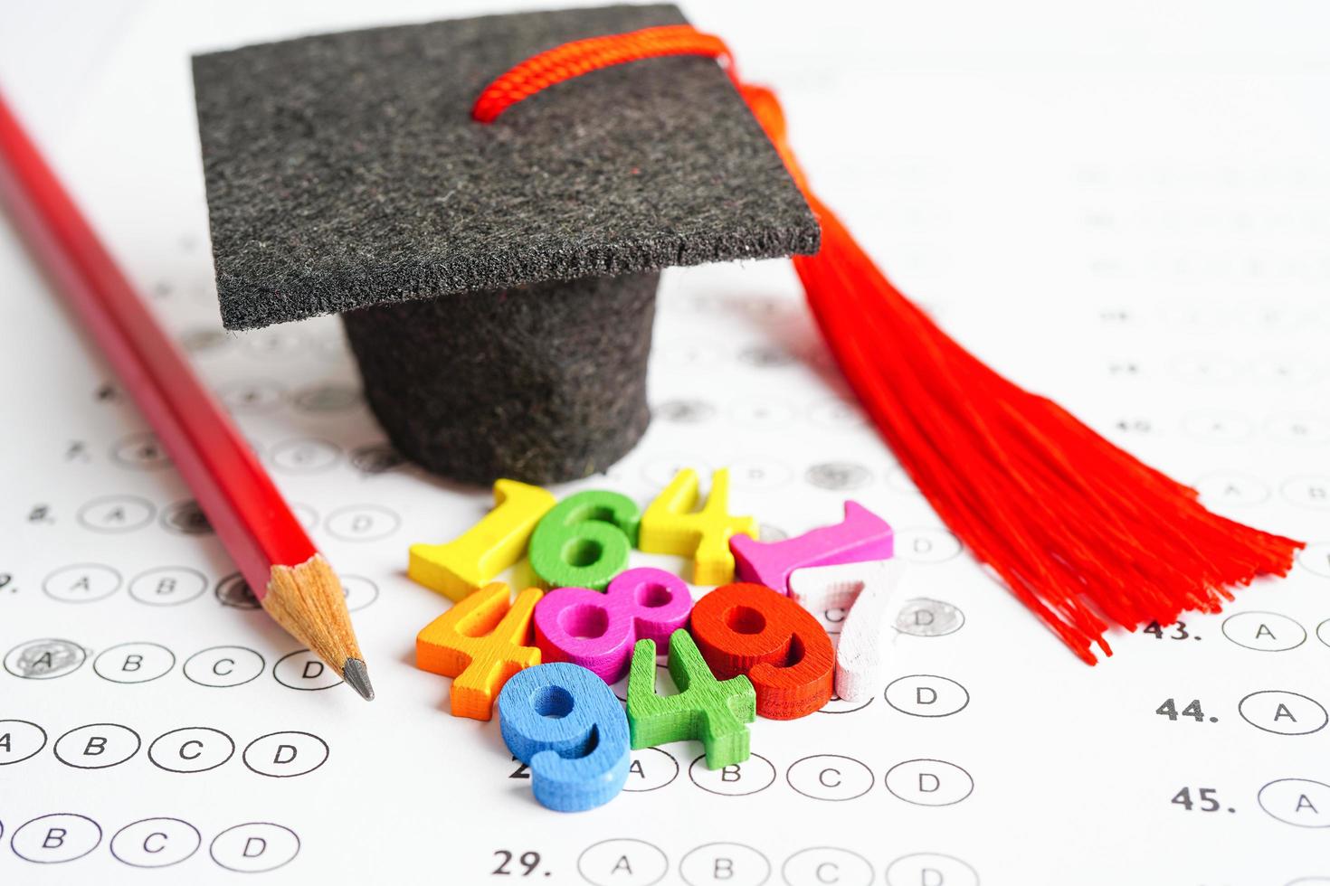 Math number with graduation gap hat on answer sheet test choice for learning Mathematic, education math concept. photo