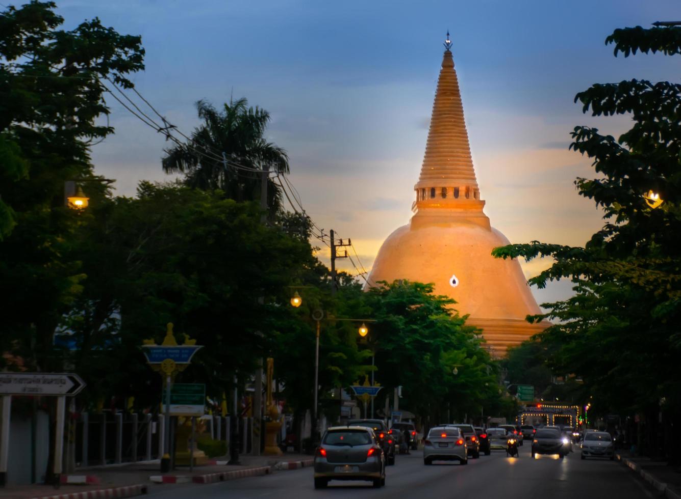 Phra Pathom Chedi during Twilight period, pagoda in Buddhism, religion of people in Thailand, beauty of pagoda. photo