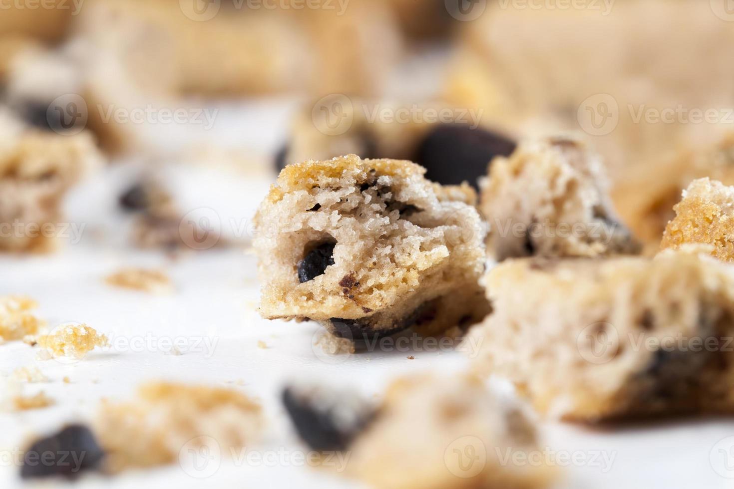 delicious wheat flour cookies and chocolate drops photo