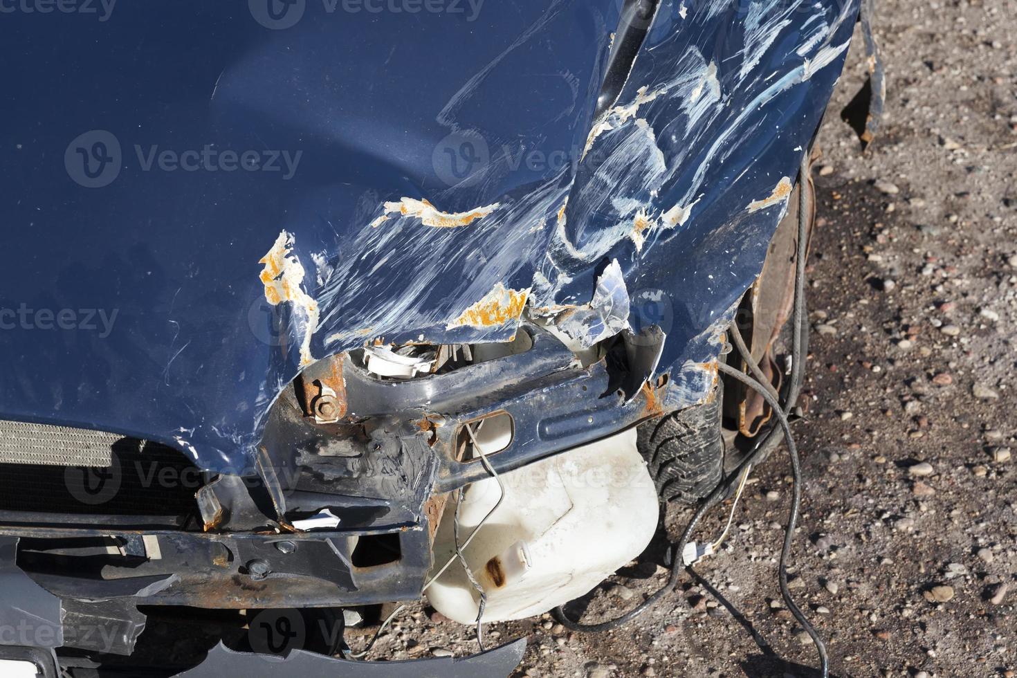 blue car after an accident photo