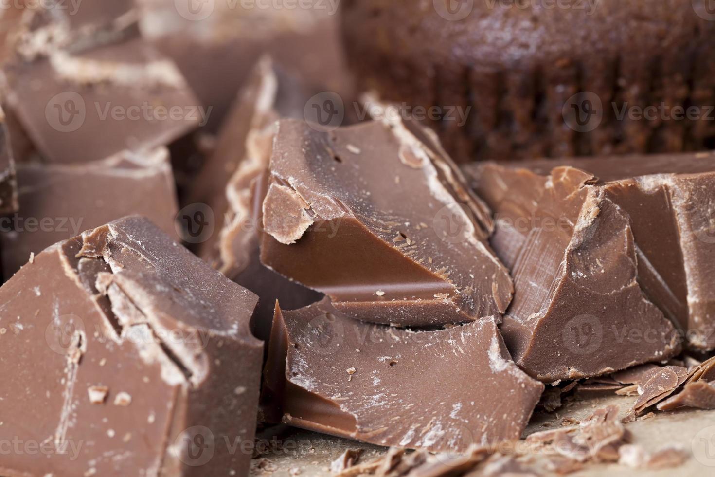broken into several parts pieces of chocolate photo