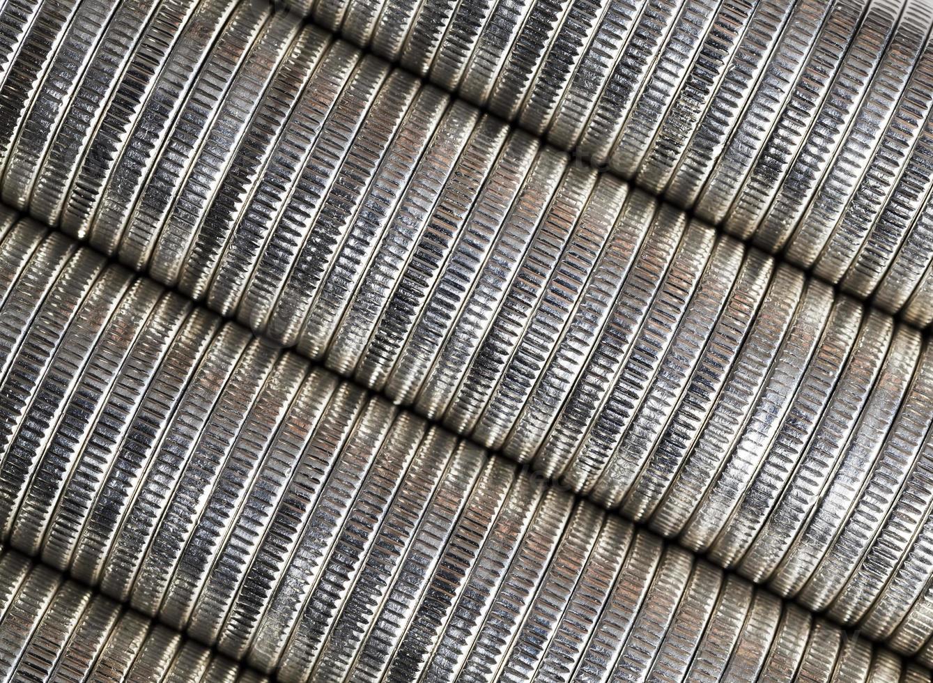 coins of silver color stacked together photo