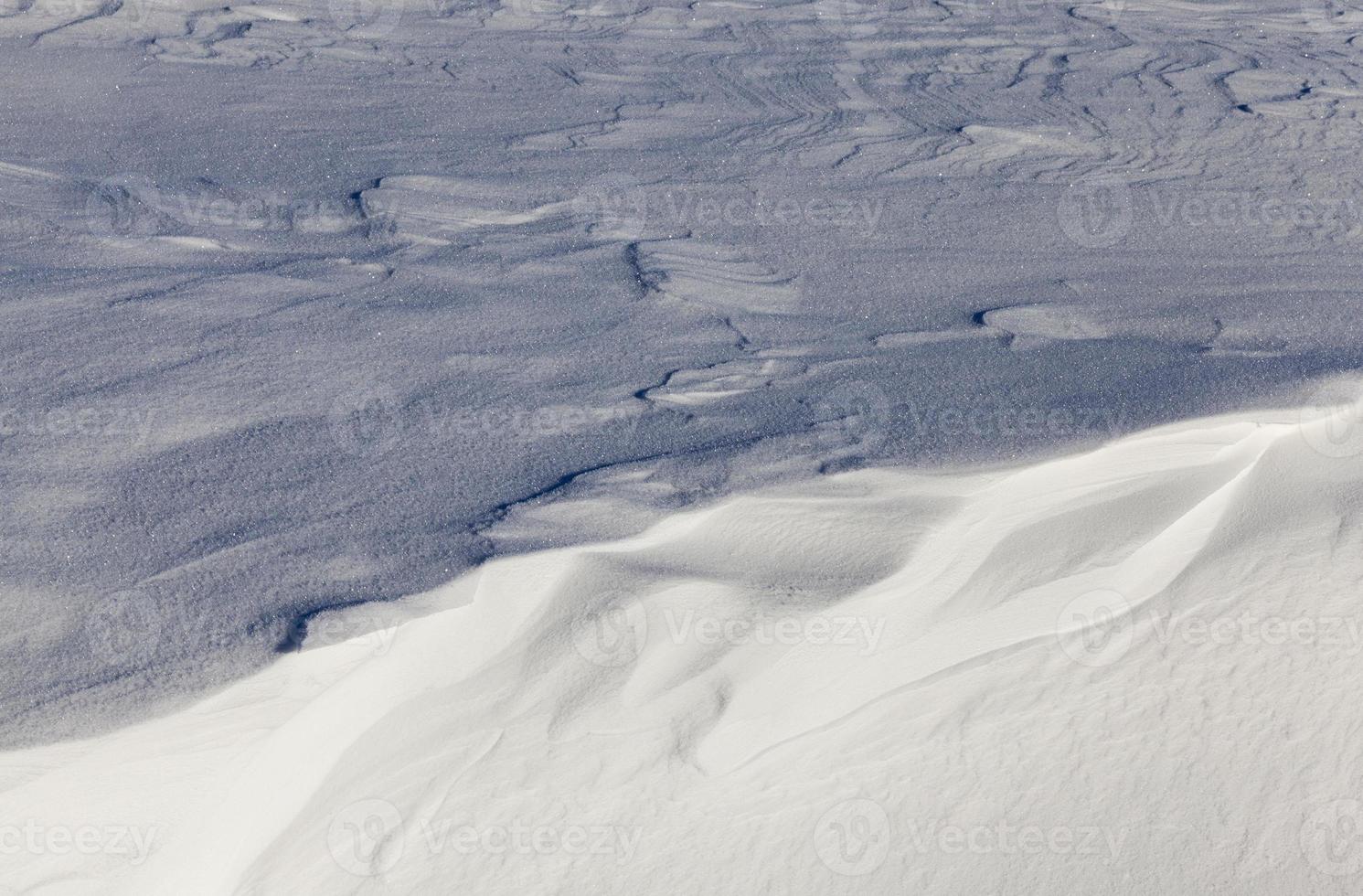 Snow drifts in winter photo