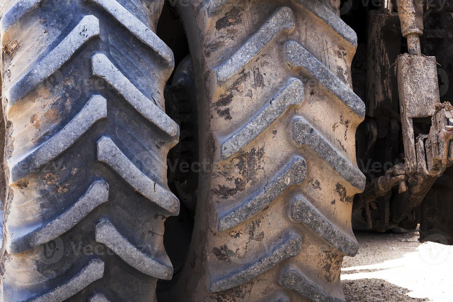 wheel tractor  . dirty wheels photo