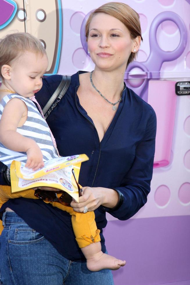 LOS ANGELES, SEP 26 - Pearl Osbourne, Lisa Stelly at the Doc McStuffins Doc Mobile Event at The Grove on September 26, 2013 in Los Angeles, CA photo