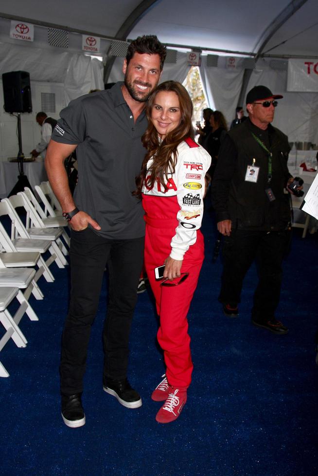 LOS ANGELES, APR 9 - Maksim Chmerkovskiy, Kate del Castillo at the Toyota ProCeleb Race Press Day 2013 at the Toyoto Grand Prix Circuit on April 9, 2013 in Long Beach, CA photo