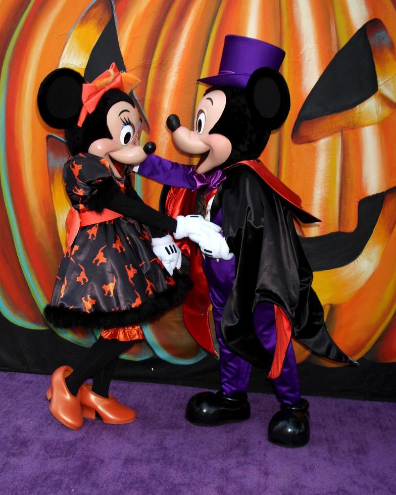 LOS ANGELES, OCT 1 - Minnie Mouse, Mickey Mouse at the VIP Disney Halloween Event at Disney Consumer Product Pop Up Store on October 1, 2014 in Glendale, CA photo