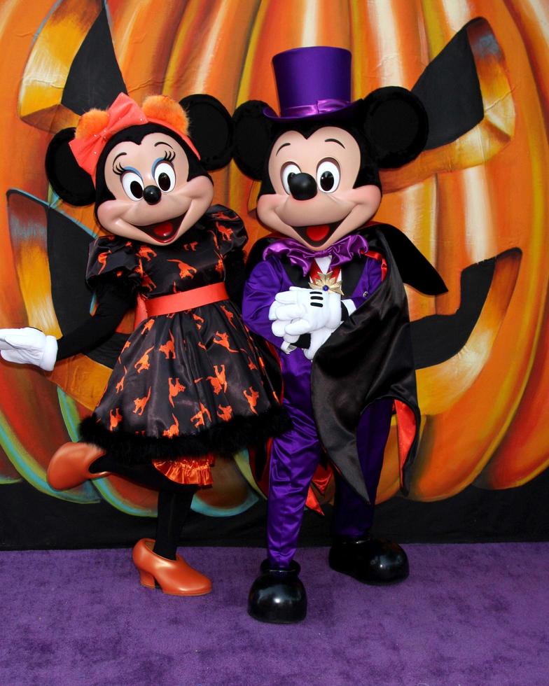 LOS ANGELES, OCT 1 - Minnie Mouse, Mickey Mouse at the VIP Disney Halloween Event at Disney Consumer Product Pop Up Store on October 1, 2014 in Glendale, CA photo