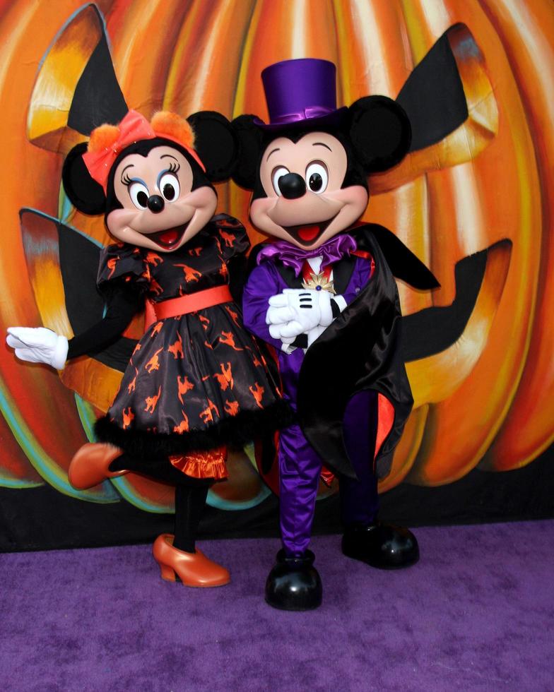LOS ANGELES, OCT 1 - Minnie Mouse, Mickey Mouse at the VIP Disney Halloween Event at Disney Consumer Product Pop Up Store on October 1, 2014 in Glendale, CA photo