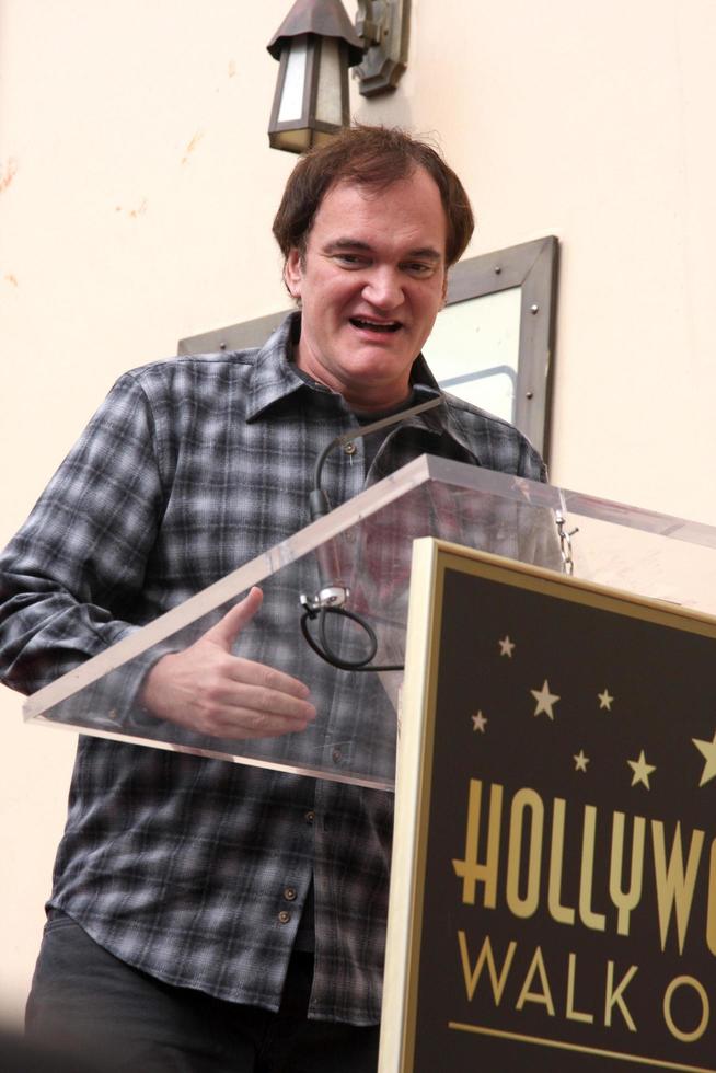 LOS ANGELES, DEC 1 - Quentin Tarantino at the Christoph Waltz Hollywood Walk of Fame Star Ceremony at the Hollywood Boulevard on December 1, 2014 in Los Angeles, CA photo