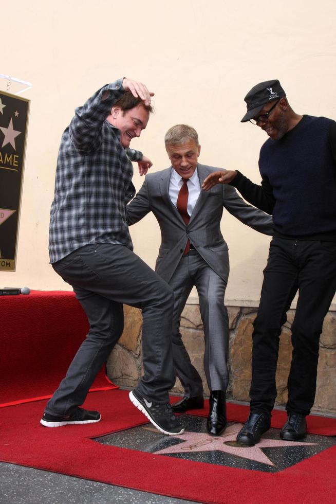 LOS ANGELES, DEC 1 - Quentin Tarantino, Christoph Waltz, Samuel L Jackson at the Christoph Waltz Hollywood Walk of Fame Star Ceremony at the Hollywood Boulevard on December 1, 2014 in Los Angeles, CA photo
