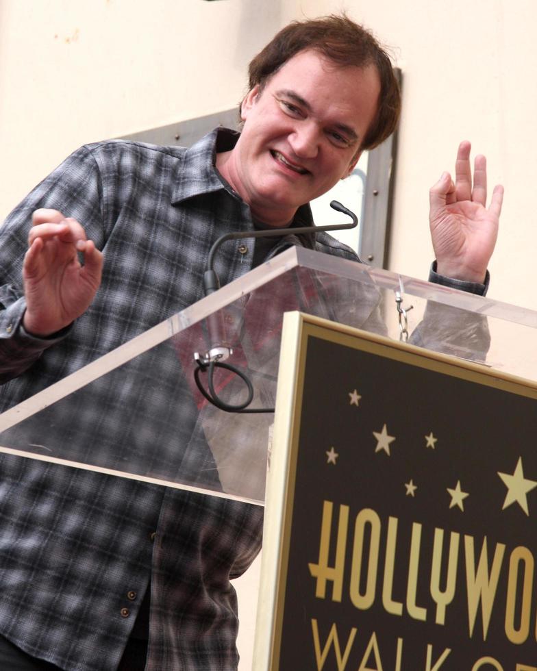 LOS ANGELES, DEC 1 - Quentin Tarantino at the Christoph Waltz Hollywood Walk of Fame Star Ceremony at the Hollywood Boulevard on December 1, 2014 in Los Angeles, CA photo