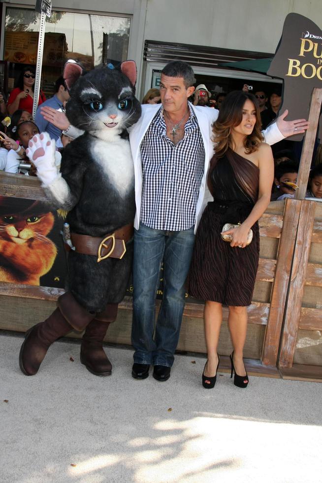 LOS ANGELES, OCT 23 - Antonio Banderas, Salma Hayek arriving at the Puss In Boots Premiere at the Regency Village Theater on October 23, 2011 in Westwood, CA photo