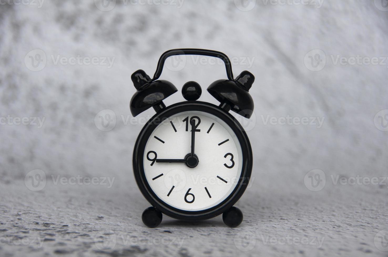 Alarm clock pointing at 9 o'clock with customizable space for ideas or text. Copy space photo
