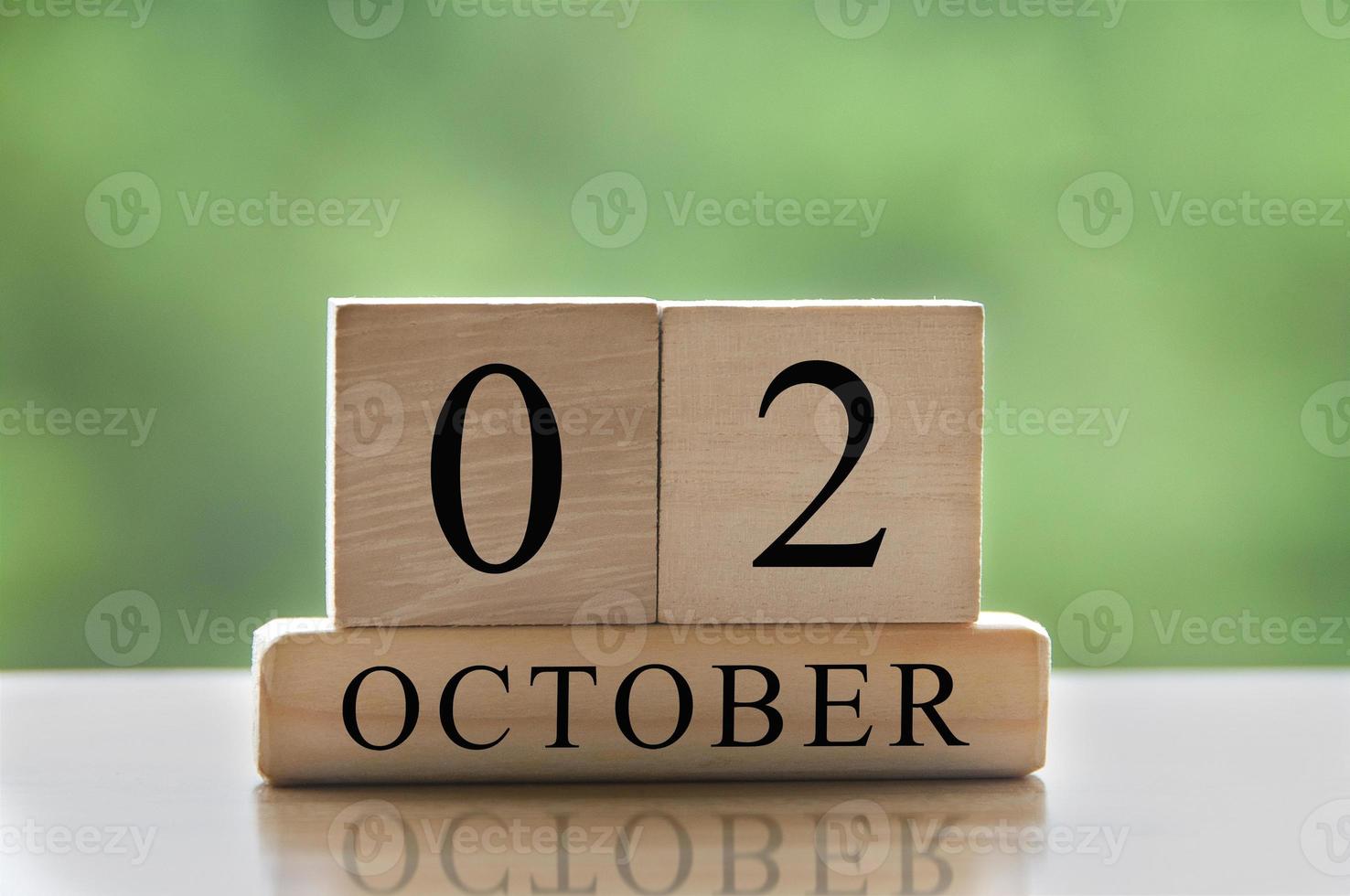 October 2 calendar date text on wooden blocks with copy space for ideas. Copy space and calendar concept photo