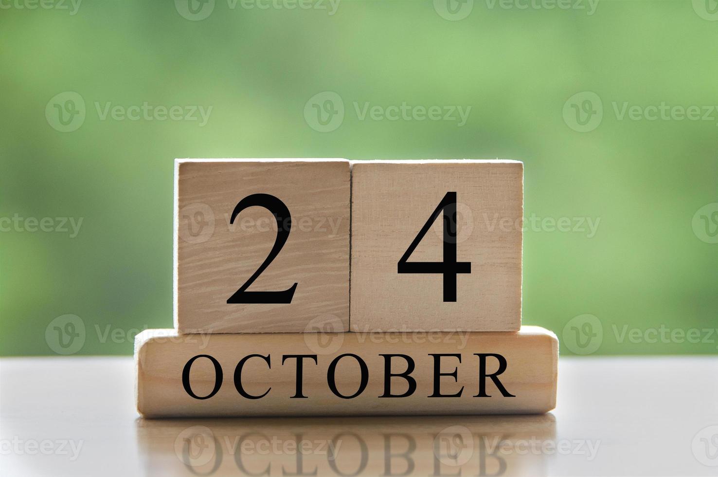 October 24 calendar date text on wooden blocks with copy space for ideas or text. Copy space and calendar concept photo