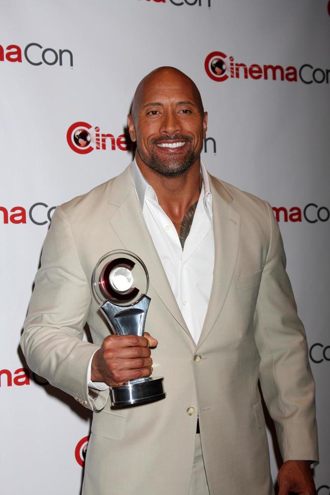 LAS VEGAS, APR 23 - Dwayne Johnson arrives at the Paramount Studios Presentation at CinemaCom 2012 at Caesars Palace on April 23, 2012 in Las Vegas, NV photo