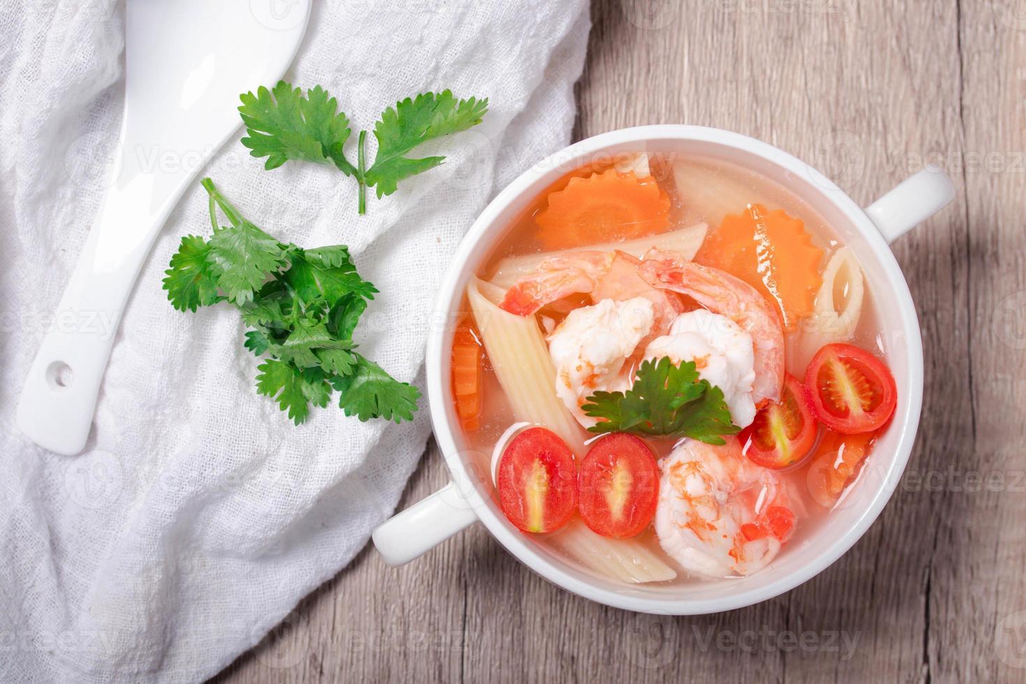 Shrimp and Vegetable Macaroni Soup in White Bowl photo