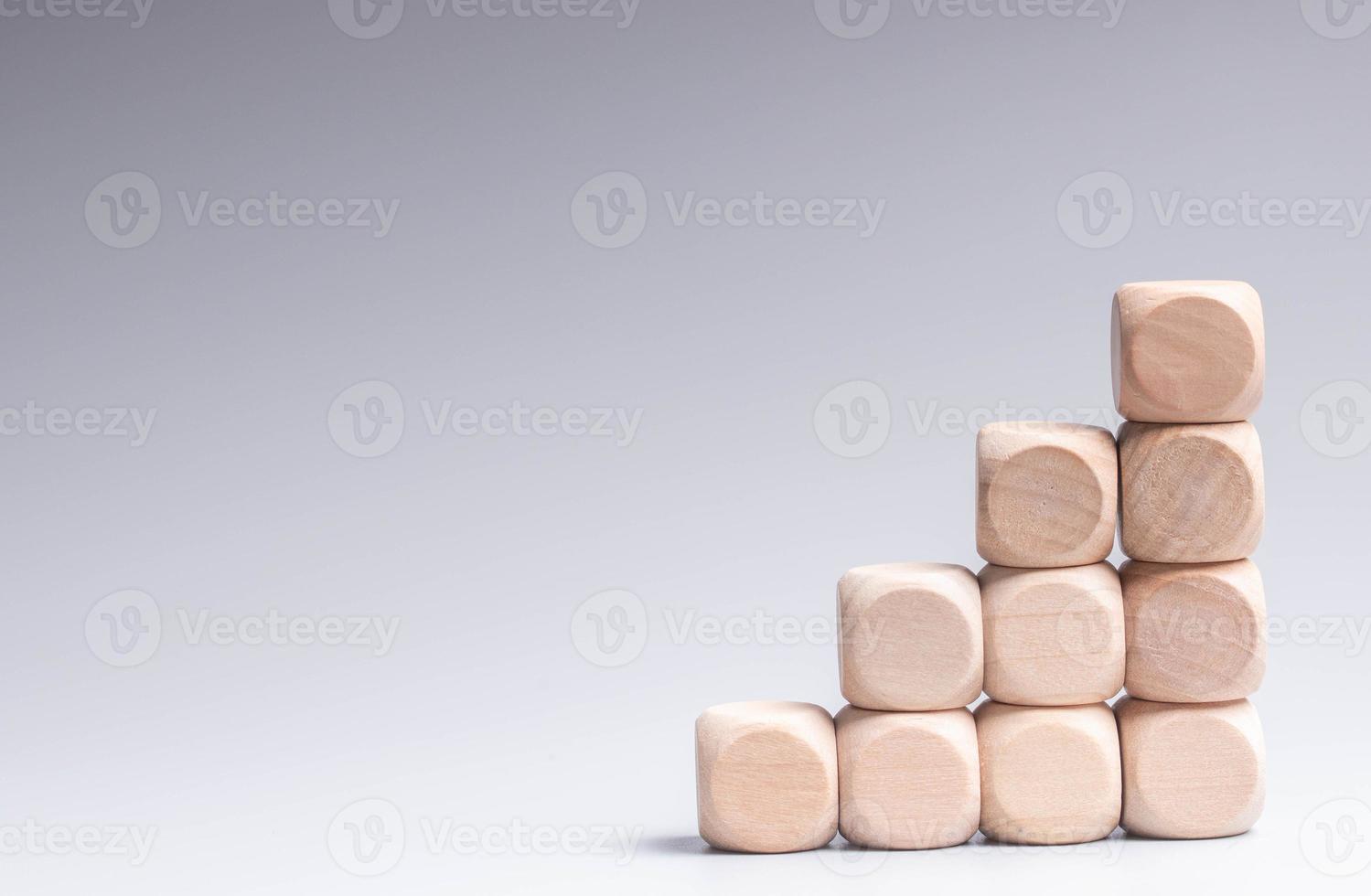 Stepped wooden cube mockup on gray background photo