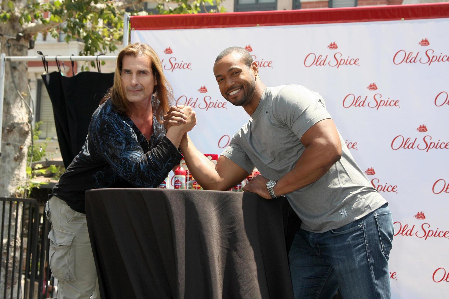 LOS ANGELES, JUL 28 - Fabio, Isaiah Mustafa at a public appearance to promote the Epic Old Spice Challenge at The Grove on July 28, 2011 in Los Angeles, CA photo