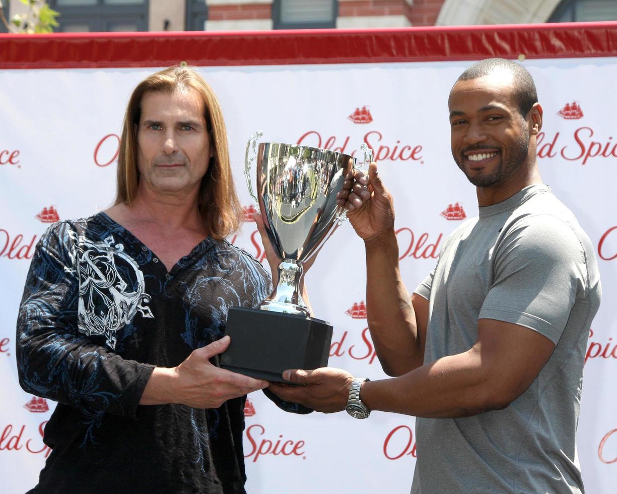 LOS ANGELES, JUL 28 - Fabio, Isaiah Mustafa at a public appearance to promote the Epic Old Spice Challenge at The Grove on July 28, 2011 in Los Angeles, CA photo