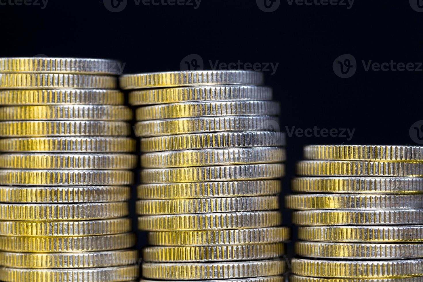 a pile of silver coins photo