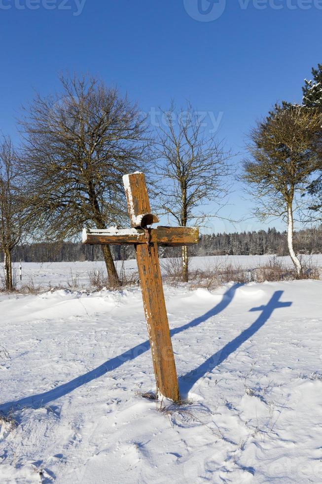 old wooden sagging cross photo