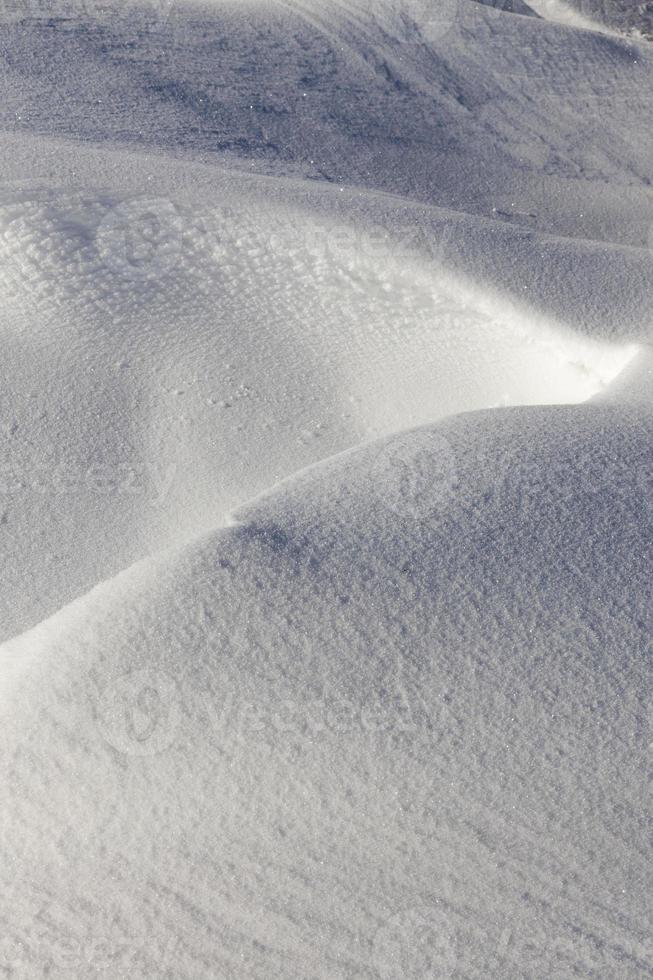 Snow drifts in winter photo