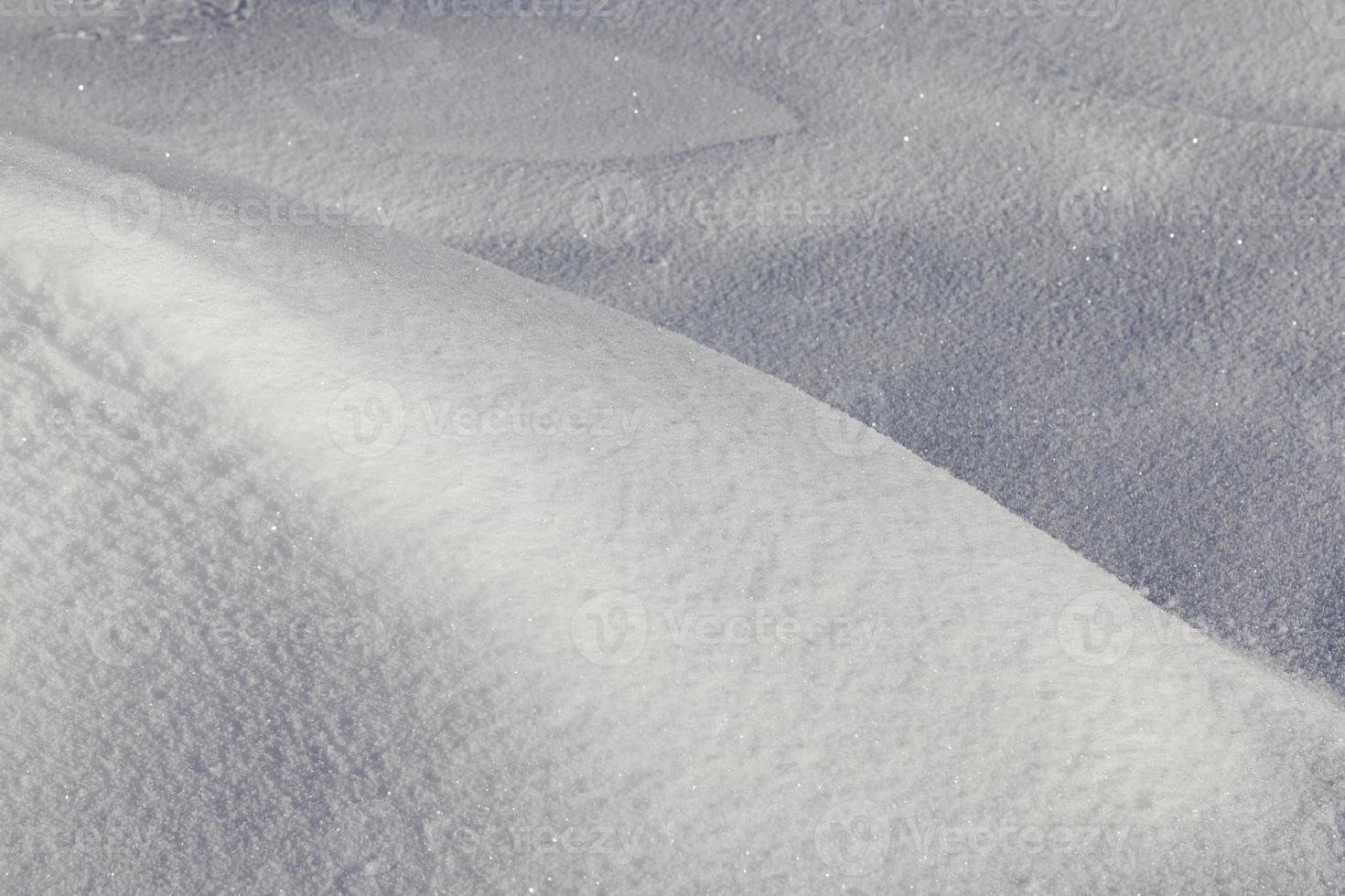 Snow drifts in winter photo