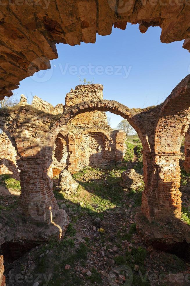fortress ruins - ruins of the ancient fortress located in the village of Golshany, Belarus photo