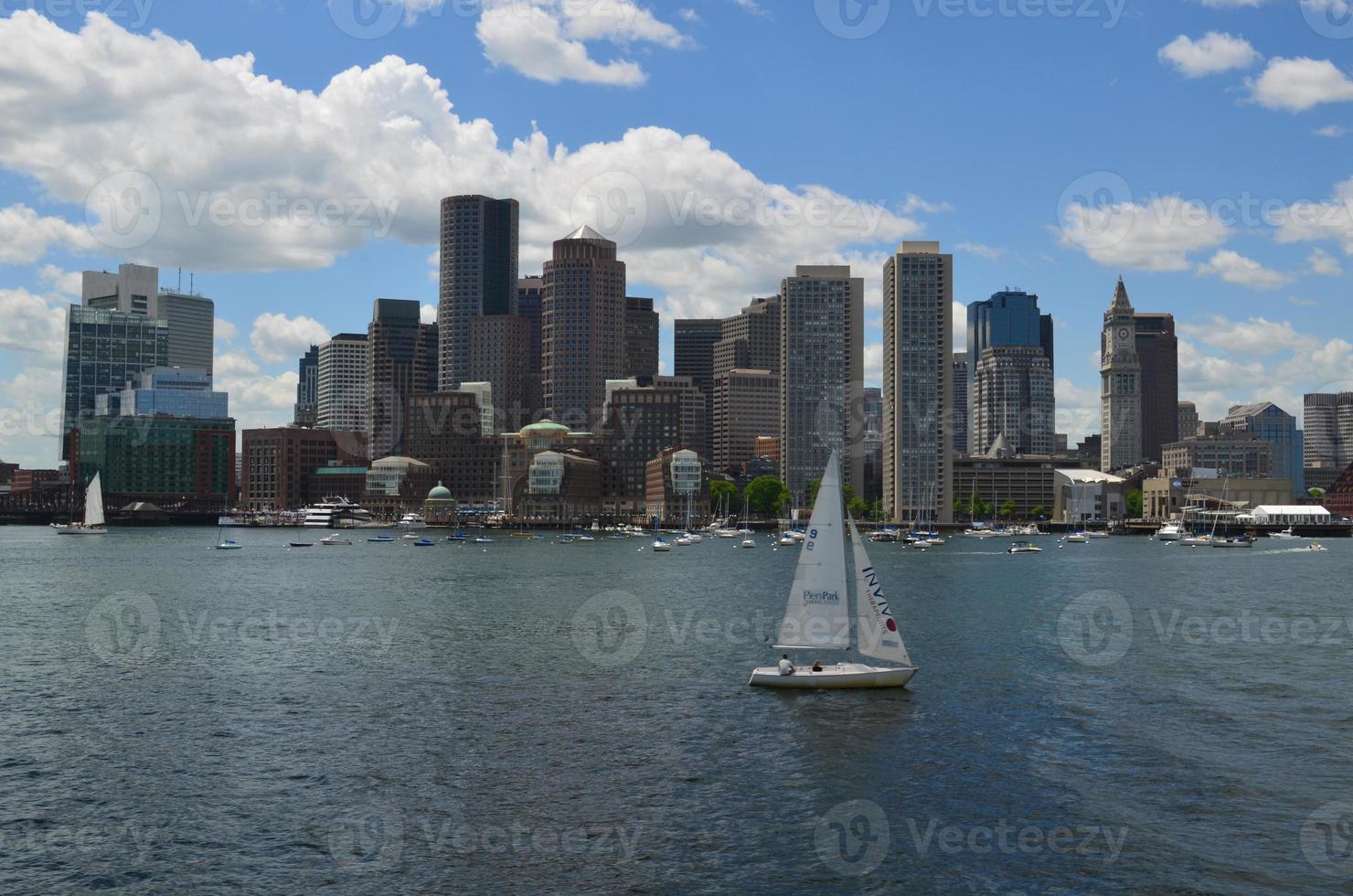 White Sailboat in Boston Harbor on a Summer Day photo