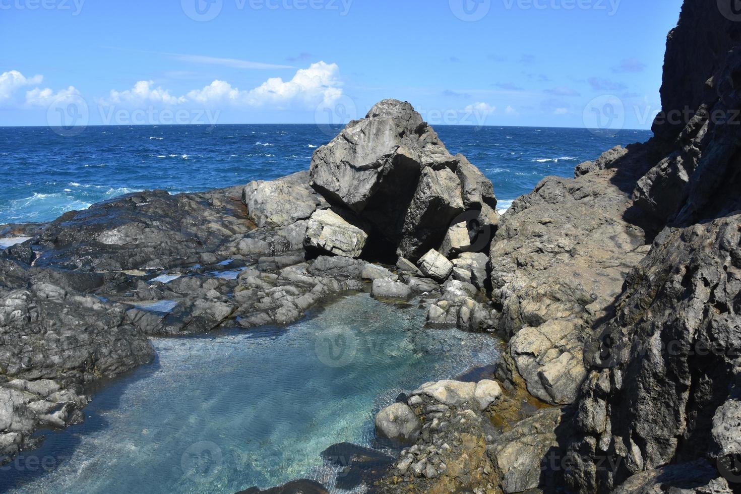 Shallow Tidal Natural Pool Along the Coast of Aruba photo