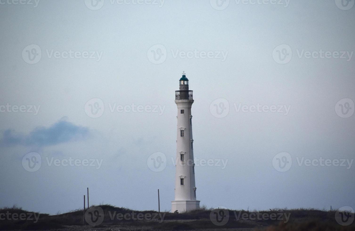 Towering California Lighthouse in the Early Morning Hours photo