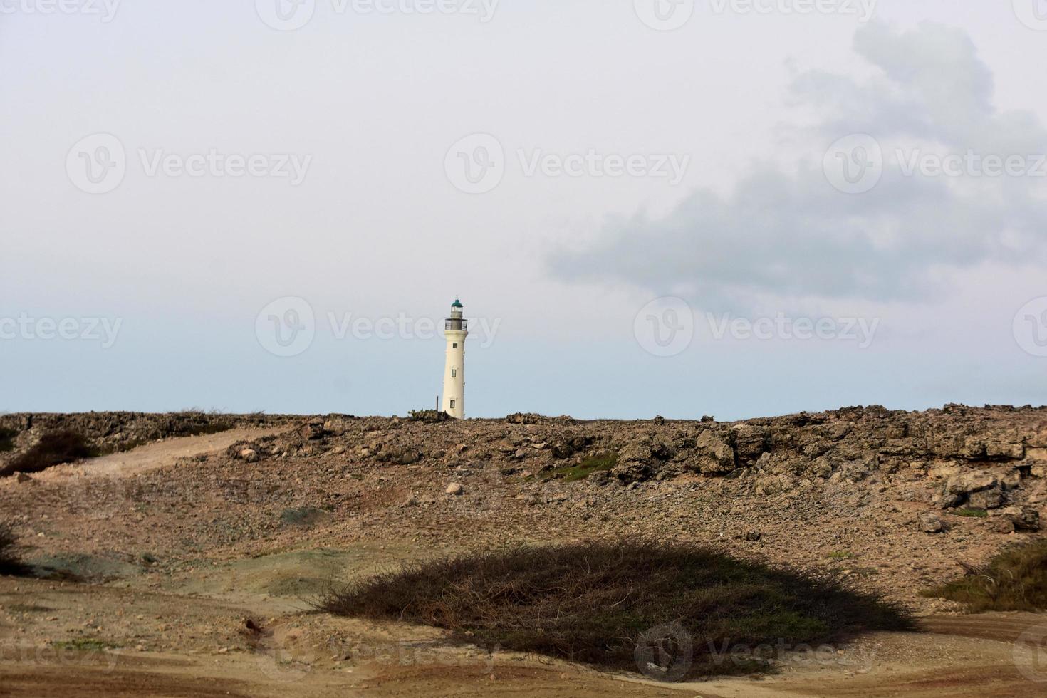 California Lighthouse in Aruba Off in the Distance photo