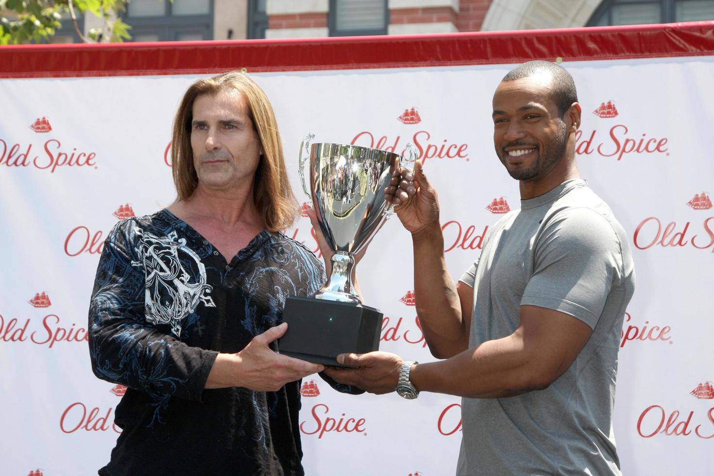 LOS ANGELES, JUL 28 - Fabio, Isaiah Mustafa at a public appearance to promote the Epic Old Spice Challenge at The Grove on July 28, 2011 in Los Angeles, CA photo