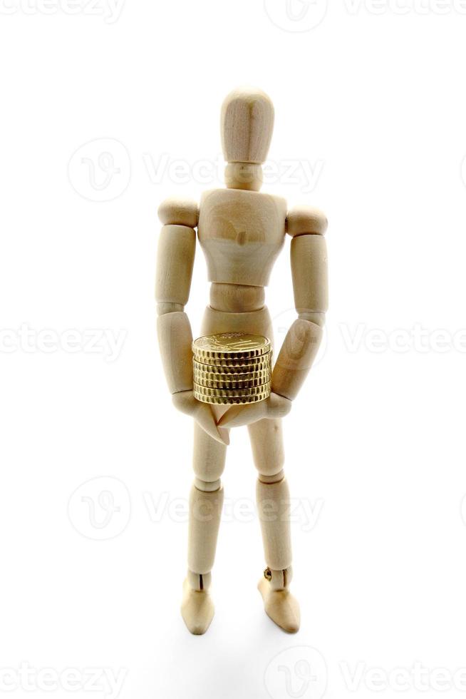 Wooden mannequin and money photo
