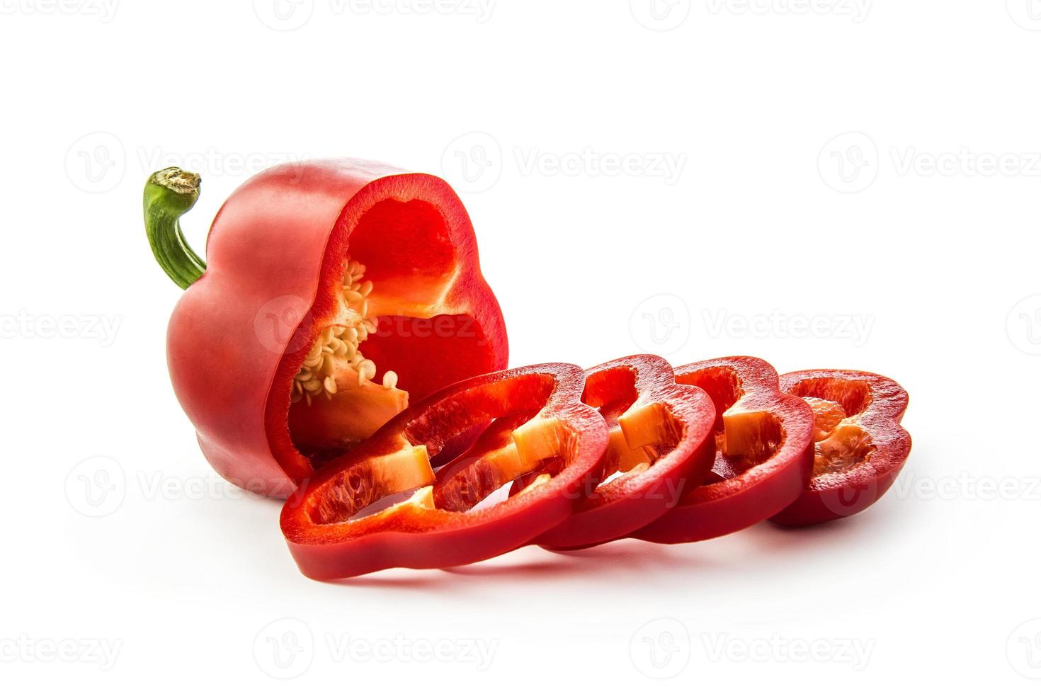 Sliced pepper on white photo