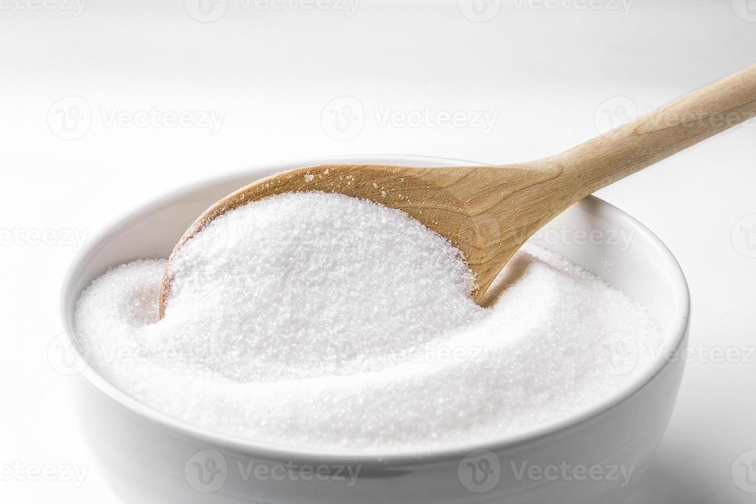 Spoon with sugar photo