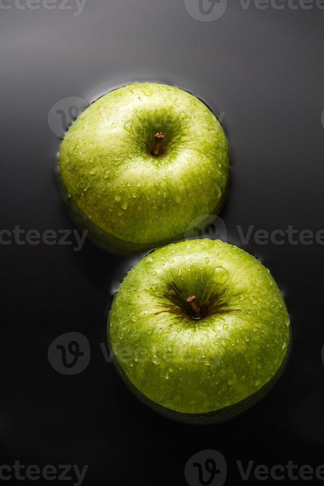 Two apples on water photo