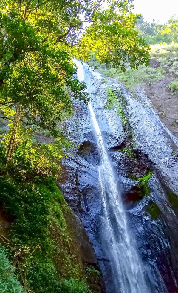 beautiful natural scenery of dolo waterfall seen from below photo