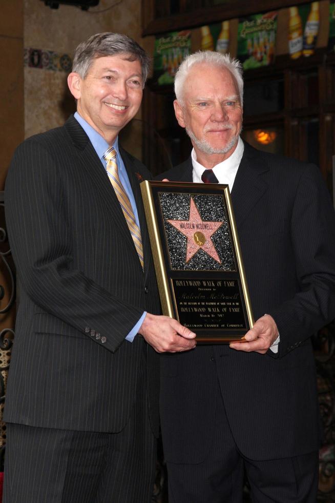 LOS ANGELES, MAR 16 - Leron Gubler, Malcolm McDowell at the Malcolm McDowell Walk of Fame Star Ceremony for The Muppets at the Hollywood Boulevard on March 16, 2012 in Los Angeles, CA photo