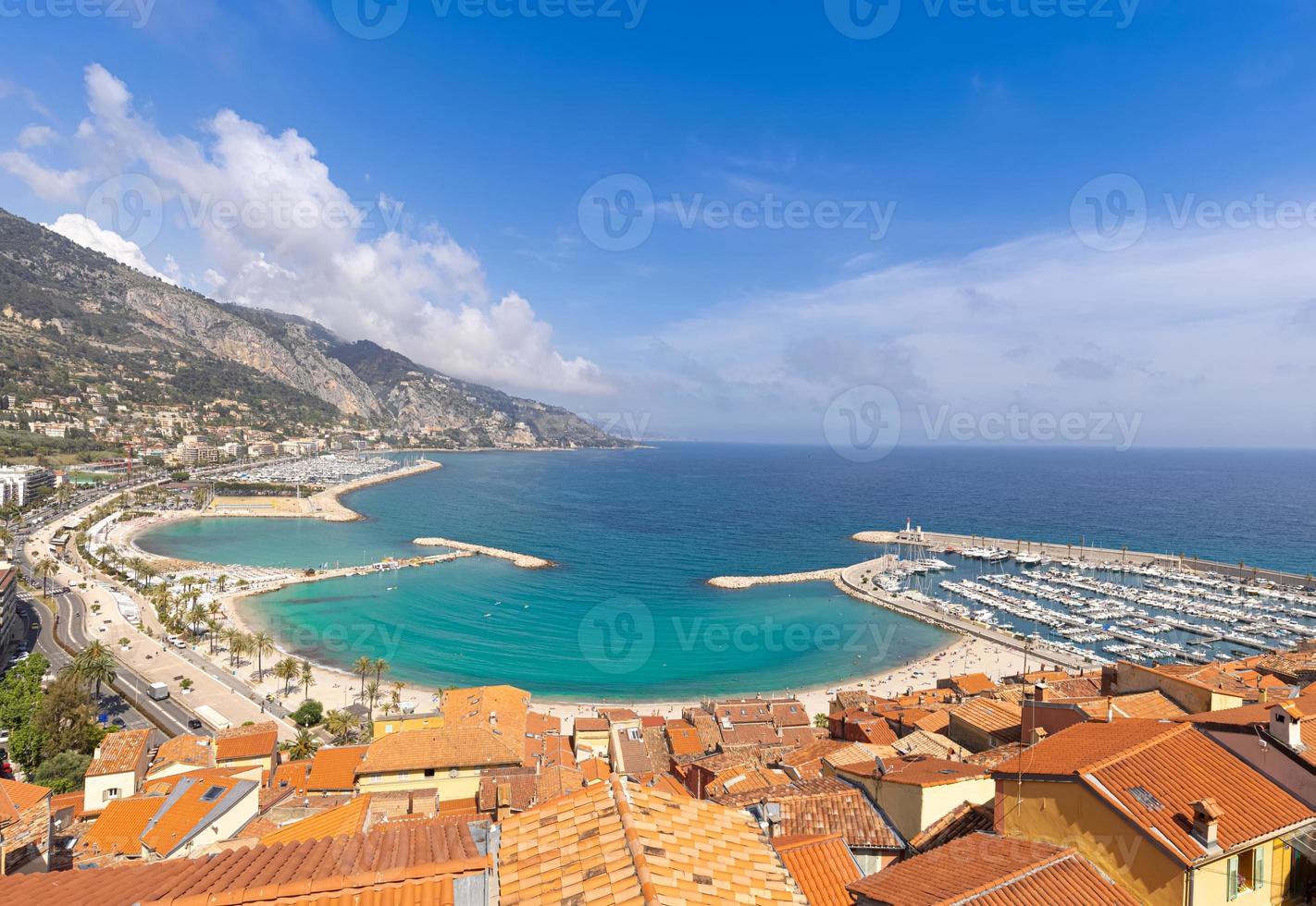 Scenic panoramic view of Menton seashore promenade and historic city in French Riviera Cote D azur photo