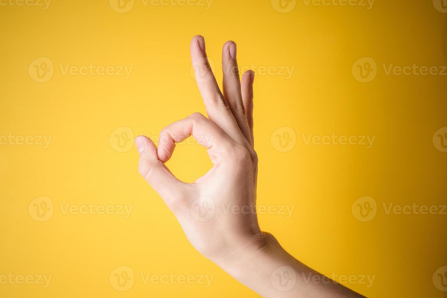 woman hand pointing gesture okay photo