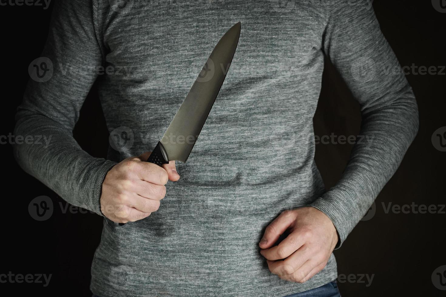 criminal with large sharp knife photo